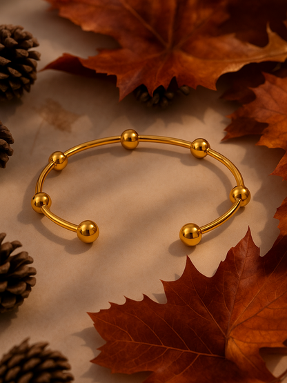 Gilded Globe Bangle